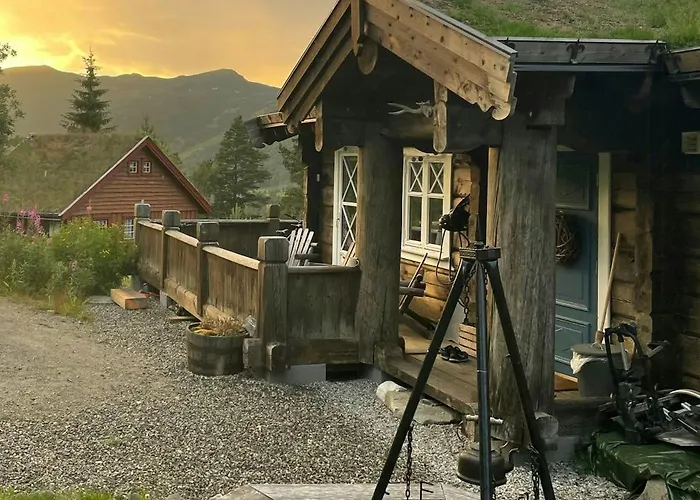 Rustic Log At The Foot Of Hardangervidda *