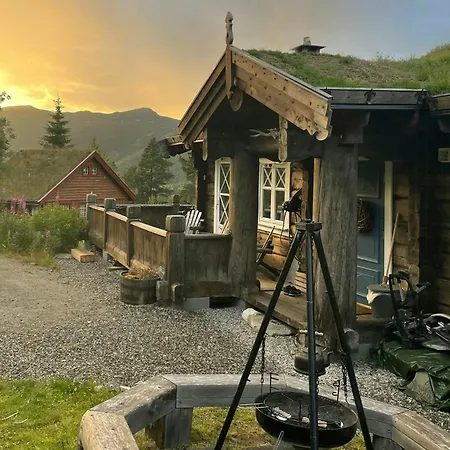 Rustic Log At The Foot Of Hardangervidda *