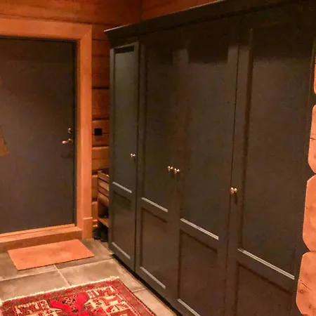 Rustic Log At The Foot Of Hardangervidda